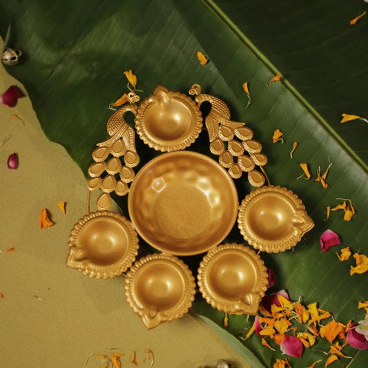 Antique Gold Twin Peacock Diya Urli Set The confetti tree
