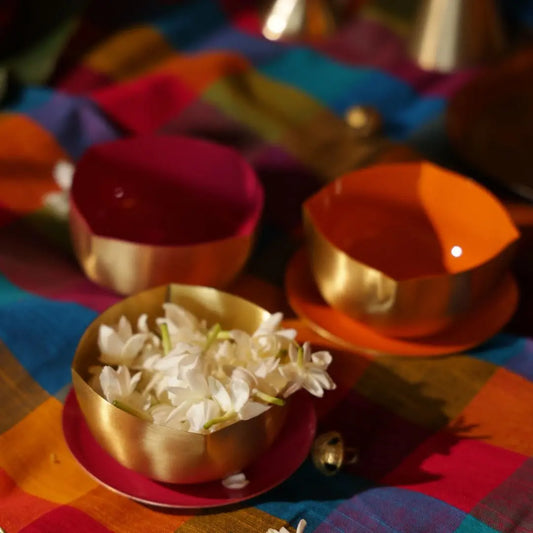 Pure Brass Diya with Orange Enamel – Matte Finish Handcrafted Oil Lamp for Pooja & Festive Décor The confetti tree