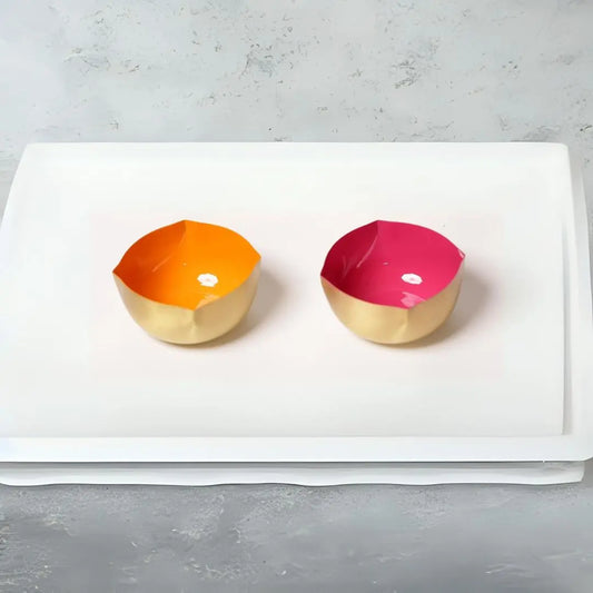 Pure Brass Diya with Pink Enamel – Matte Finish Handcrafted Oil Lamp for Pooja & Festive Décor The confetti tree