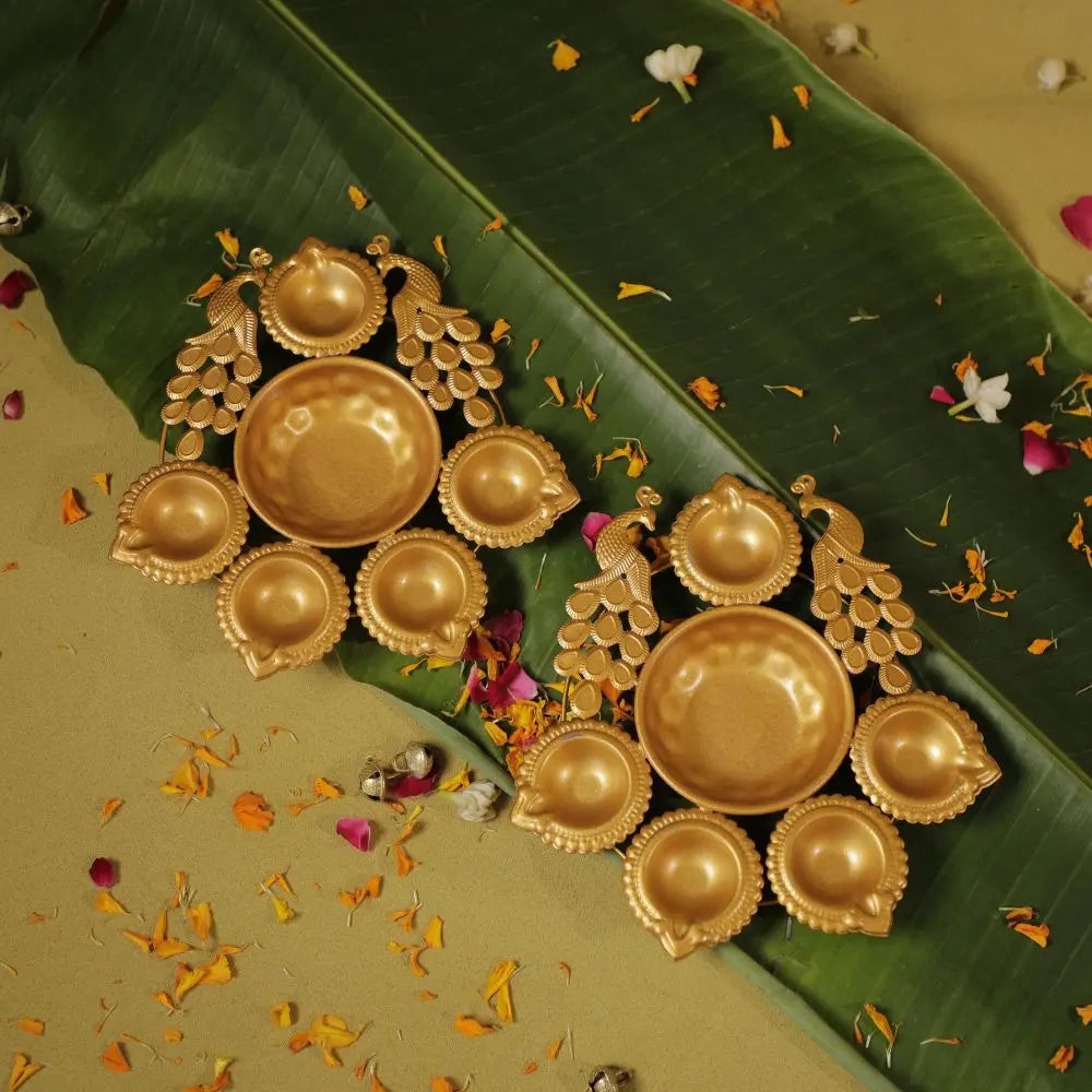 Antique Gold Twin Peacock Diya Urli Set The confetti tree