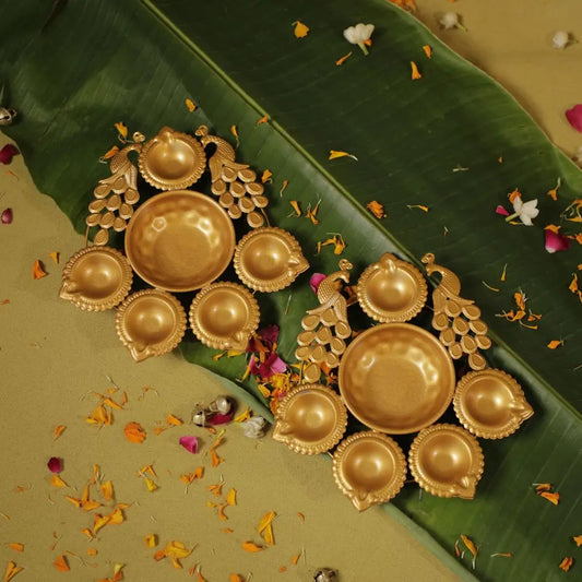 Antique Gold Twin Peacock Diya Urli Set The confetti tree