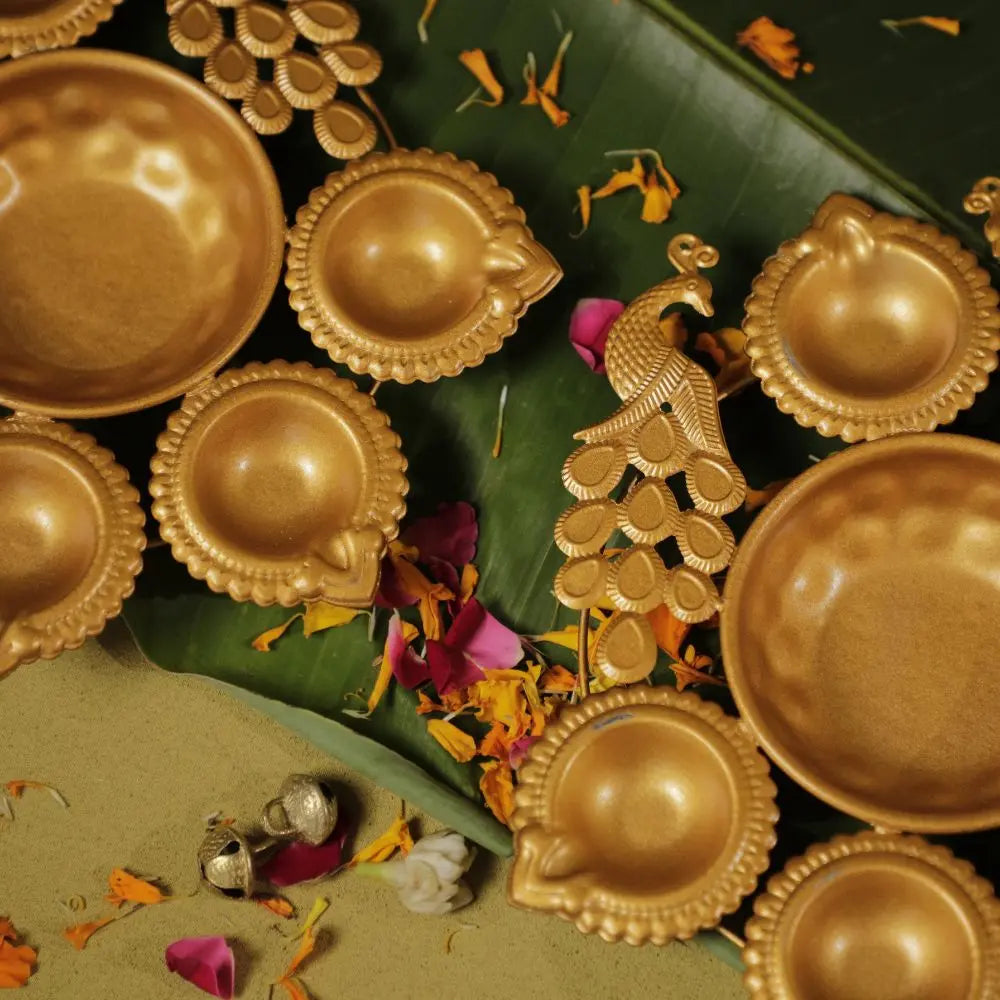 Antique Gold Twin Peacock Diya Urli Set The confetti tree