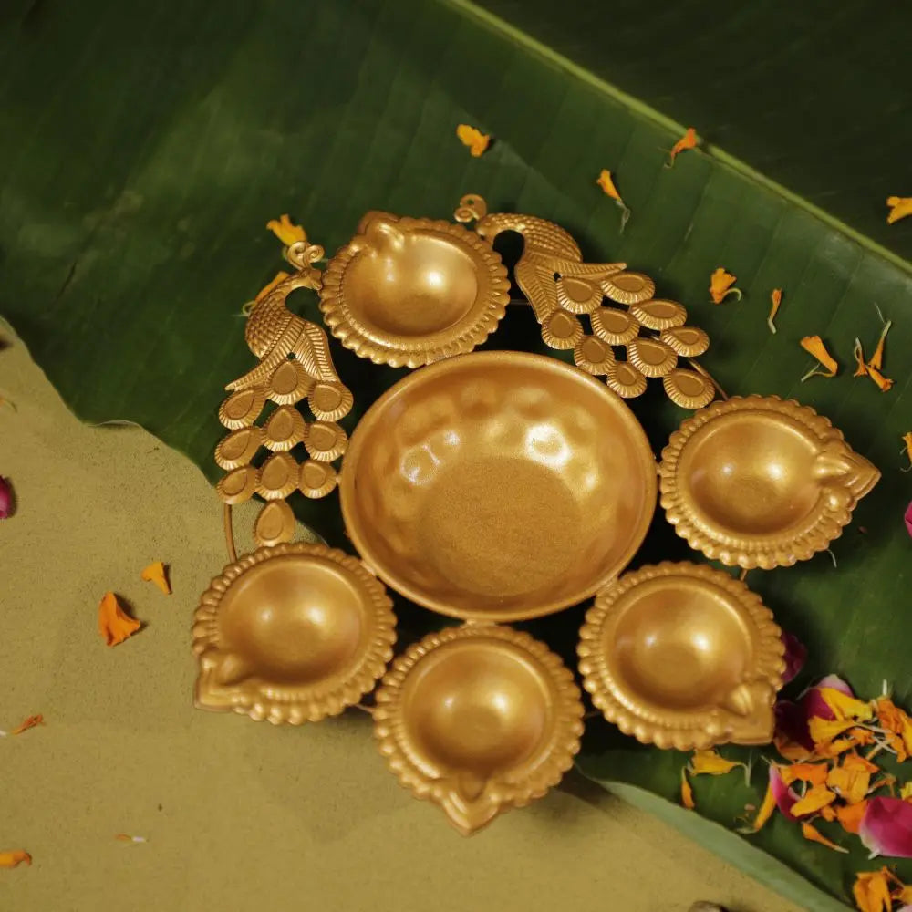 Antique Gold Twin Peacock Diya Urli Set The confetti tree