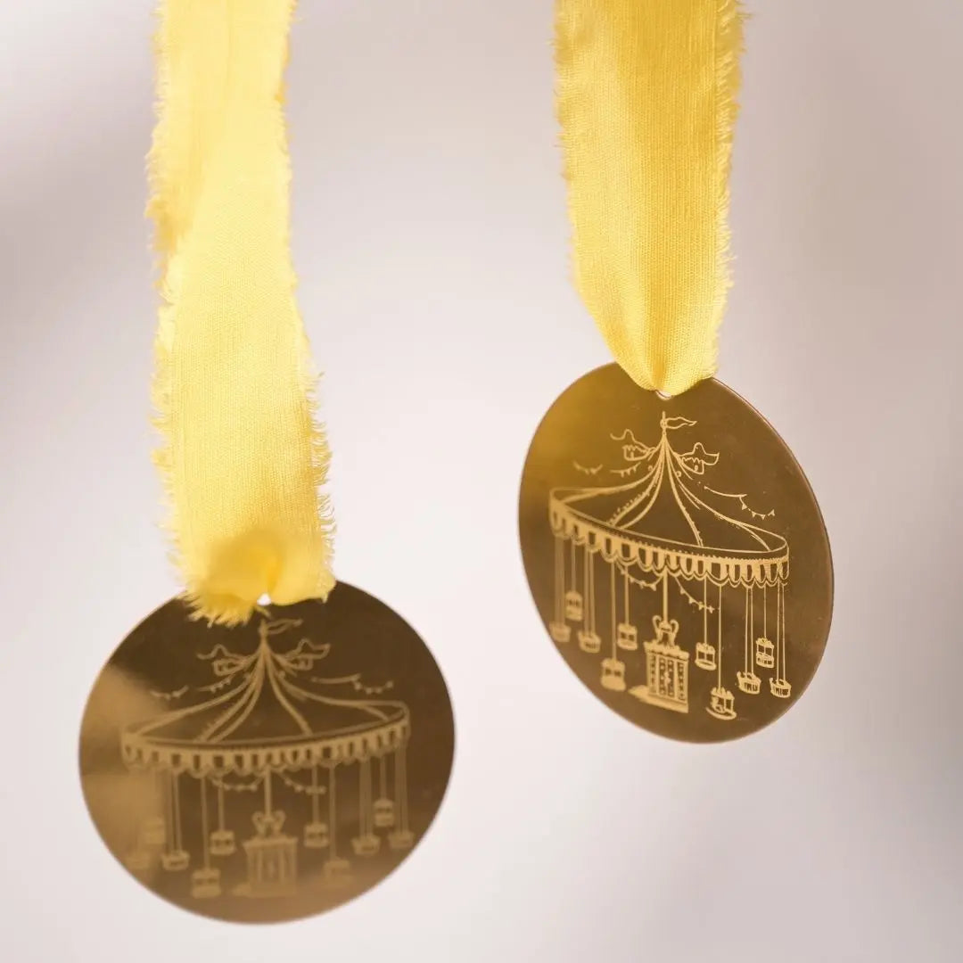 Brass Carousel Hanging Ornament – Laser-Etched Decor with Linen Yellow or Satin Green Ribbon | Luxury Christmas & Home Decor The confetti tree
