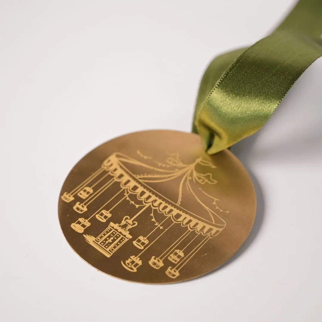 Brass Carousel Hanging Ornament – Laser-Etched Decor with Linen Yellow or Satin Green Ribbon | Luxury Christmas & Home Decor The confetti tree