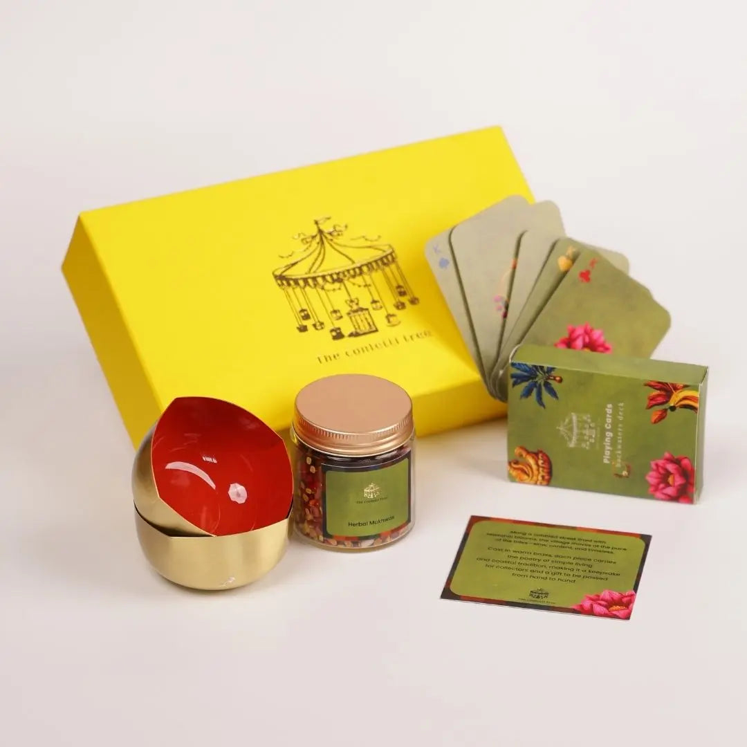 Diwali gift box - Brass diya set with playing cards and mukhwas The confetti tree