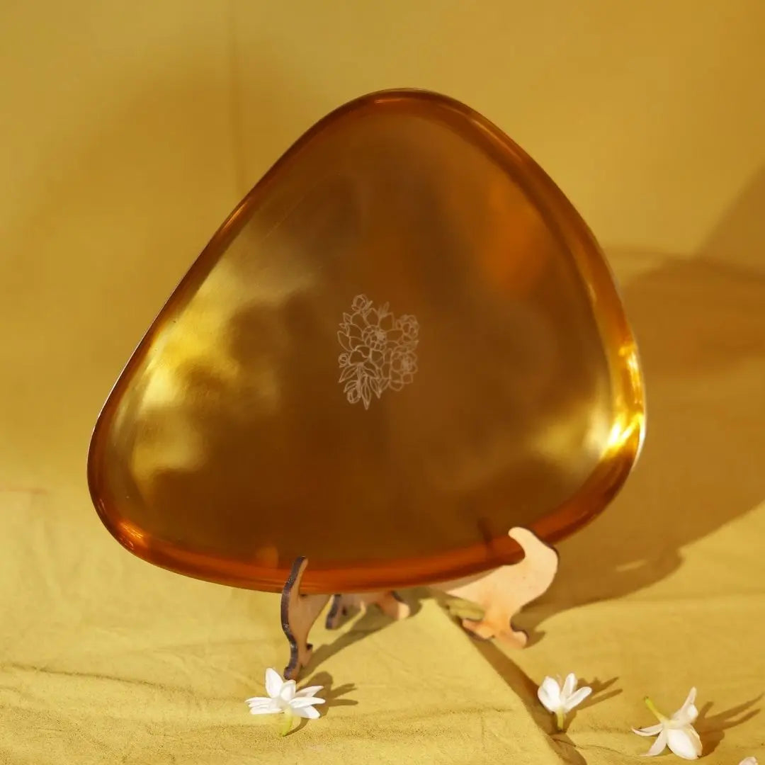 Handcrafted Brass Finish Decorative Tray – Elegant Floral Etched Serveware for Home & Festive Décor The confetti tree