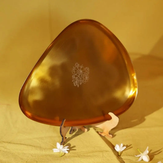 Handcrafted Brass Finish Decorative Tray – Elegant Floral Etched Serveware for Home & Festive Décor The confetti tree