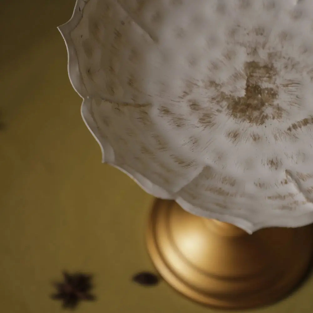 Handcrafted Scalloped Pedestal Urli Bowl – White & Gold The confetti tree