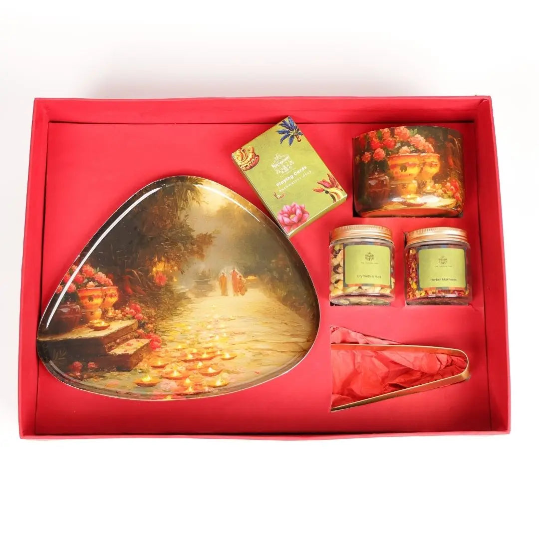 Luxury Diwali Gift Box with Brass Finish Platter, Soy Wax Candle, Dry Fruits, Mukhwas, Brass Tong & Designer Playing Cards The confetti tree