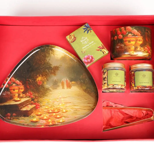 Luxury Diwali Gift Box with Brass Finish Platter, Soy Wax Candle, Dry Fruits, Mukhwas, Brass Tong & Designer Playing Cards The confetti tree