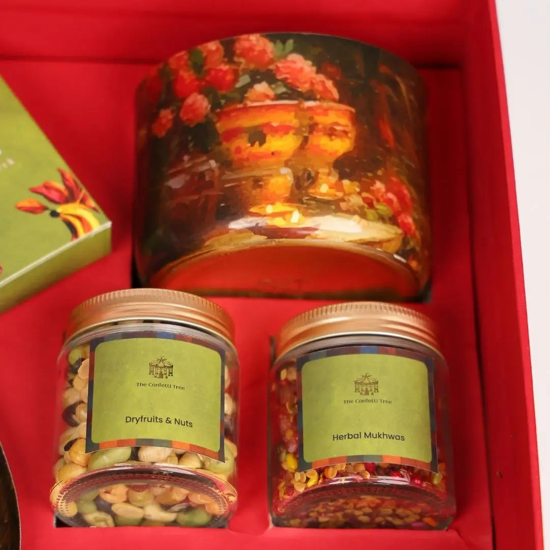 Luxury Diwali Gift Box with Brass Finish Platter, Soy Wax Candle, Dry Fruits, Mukhwas, Brass Tong & Designer Playing Cards The confetti tree