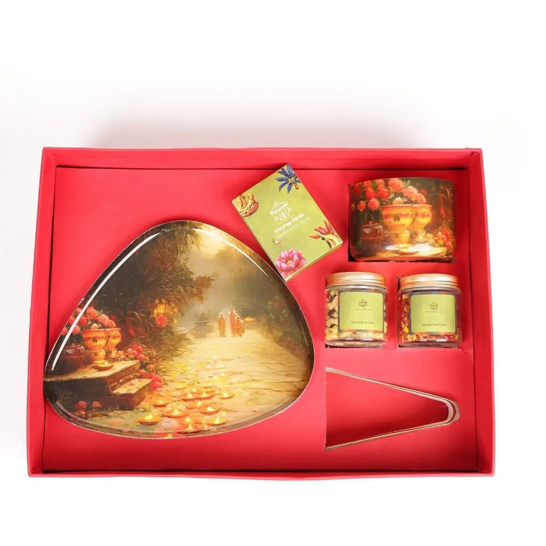 Luxury Diwali Gift Box with Brass Finish Platter, Soy Wax Candle, Dry Fruits, Mukhwas, Brass Tong & Designer Playing Cards The confetti tree
