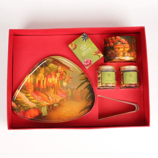 Luxury Diwali Gift Box with Brass Finish Platter, Soy Wax Candle, Dry Fruits, Mukhwas, Brass Tong & Designer Playing Cards The confetti tree