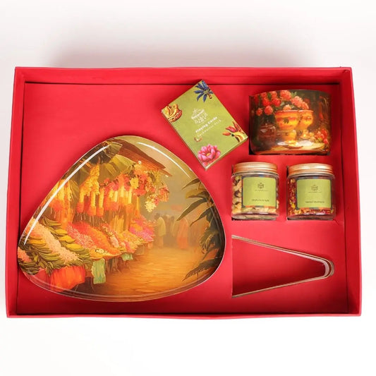 Luxury Diwali Gift Box with Brass Finish Platter, Soy Wax Candle, Dry Fruits, Mukhwas, Brass Tong & Designer Playing Cards The confetti tree
