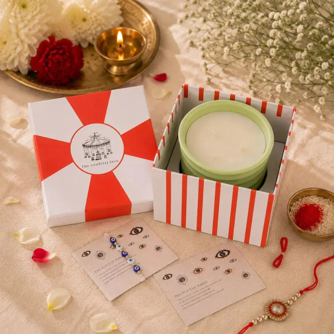 Luxury Rakhi Gift Hamper with Evil Eye Rakhi & Lumba, Ceramic Soy Wax Candle & Greeting Card | Premium Raksha Bandhan Gift Box for Bhai & Bhabhi The confetti tree