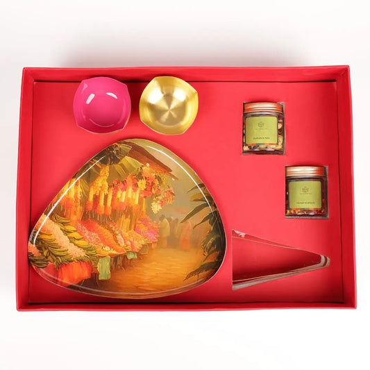 Premium Diwali Gift Box with Brass Finish Platter, Pure Brass Diyas, Brass Tong, Dry Fruits & Mukhwas The confetti tree