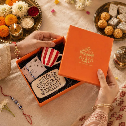 Premium Rakhi Gift Hamper with Evil Eye Rakhi & Lumba, Ceramic Trinket Tray, Stoneware Coffee Mug & Greeting Card | Luxury Raksha Bandhan Gift Box for Bhai & Bhabhi The confetti tree