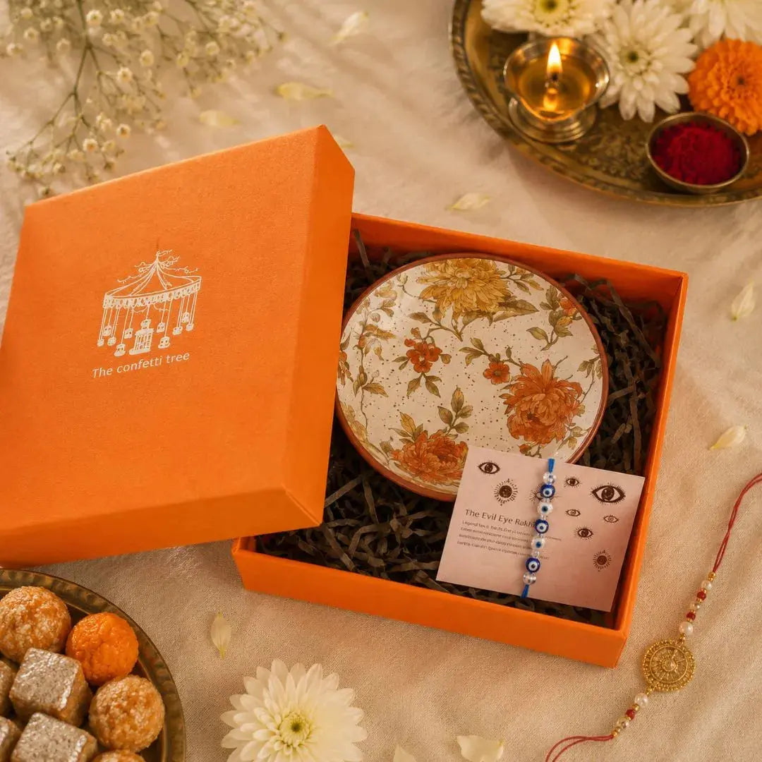 Premium Rakhi Gift Hamper with Evil Eye Rakhi & Lumba, Set of 2 Handcrafted Stoneware Bowls & Greeting Card | Luxury Raksha Bandhan Gift Box for Bhai & Bhabhi The Confetti Tree