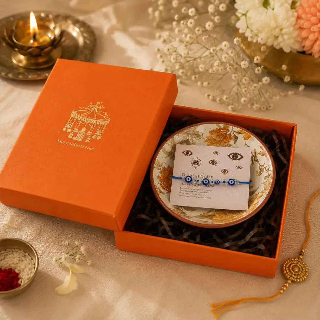Premium Rakhi Gift Hamper with Evil Eye Rakhi & Lumba, Set of 2 Handcrafted Stoneware Bowls & Greeting Card | Luxury Raksha Bandhan Gift Box for Bhai & Bhabhi The Confetti Tree