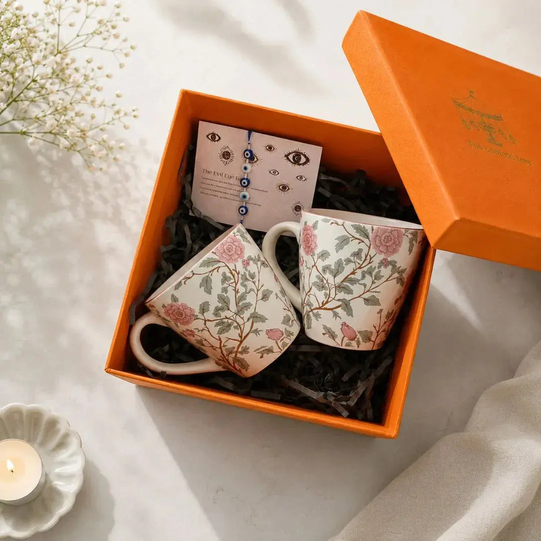 Premium Rakhi Gift Hamper with Evil Eye Rakhi & Lumba, Set of 2 Peony Ceramic Coffee Mugs & Greeting Card | Luxury Raksha Bandhan Gift Box for Bhai & Bhabhi The confetti tree