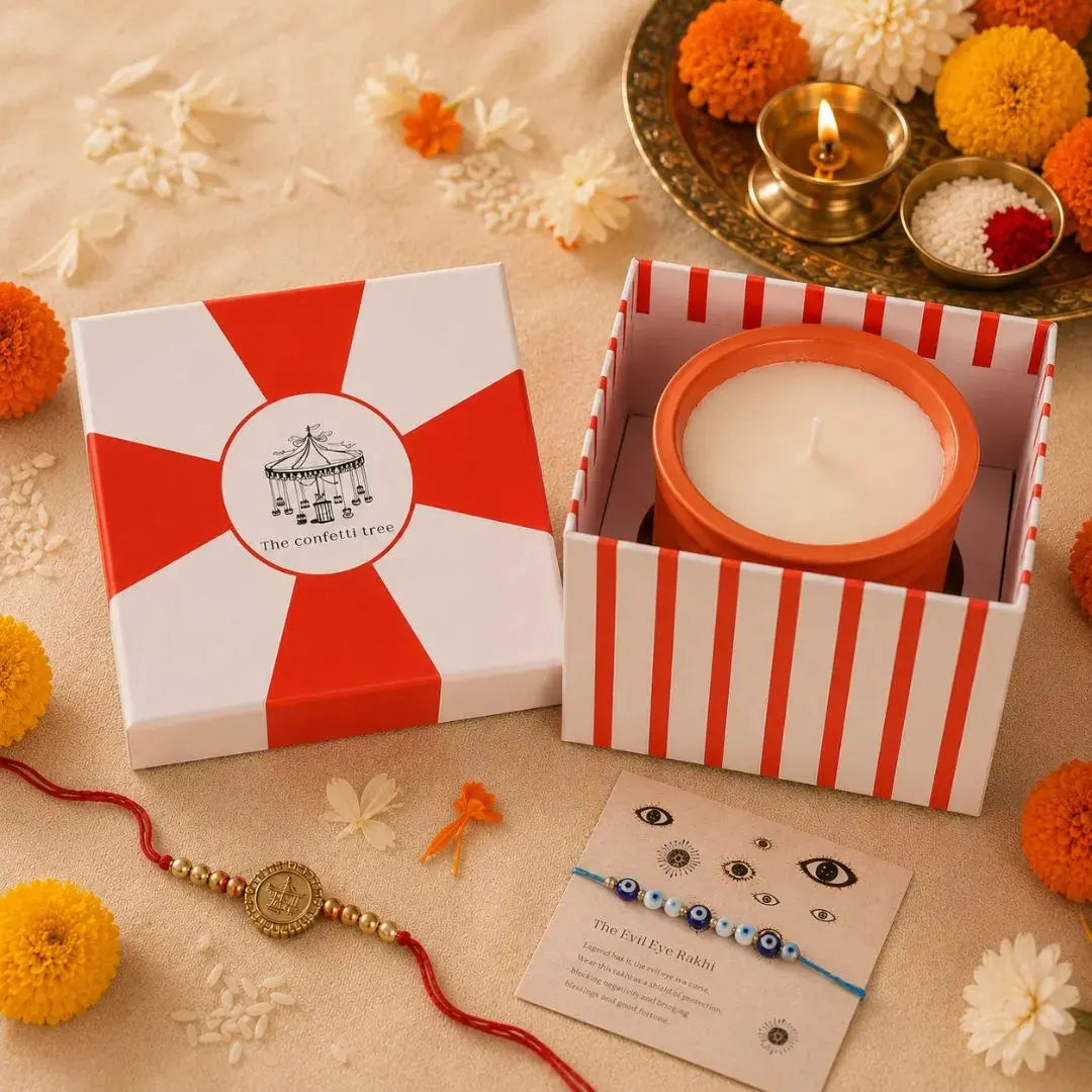 Rakhi Gift Box with Evil Eye Rakhi & Lumba Set, Soy Wax Scented Candle & Greeting Card | Premium Raksha Bandhan Gift Hamper for Bhai & Bhabhi The confetti tree