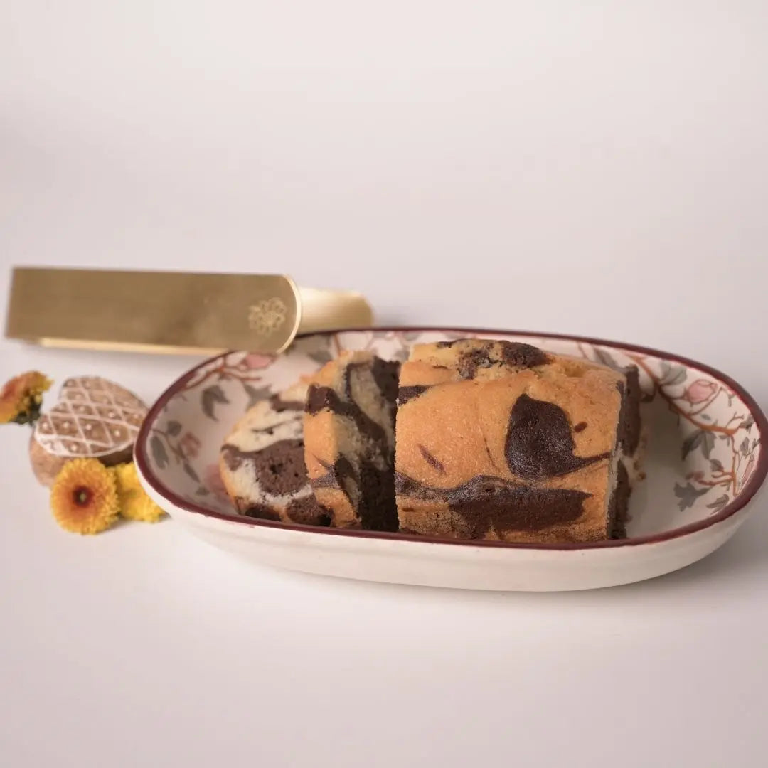 Stoneware Oval Tray with Peony Print & Brass Tong Set – Handcrafted Serveware for Snacks, Cookies & Festive Gifting The confetti tree