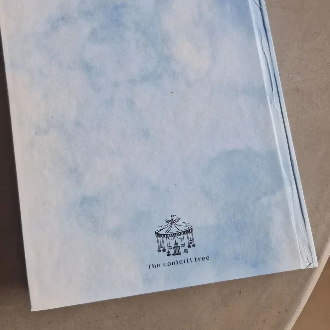 Windows of Wonder – A5 Hardbound Notebook (200 Plain Pages) The confetti tree