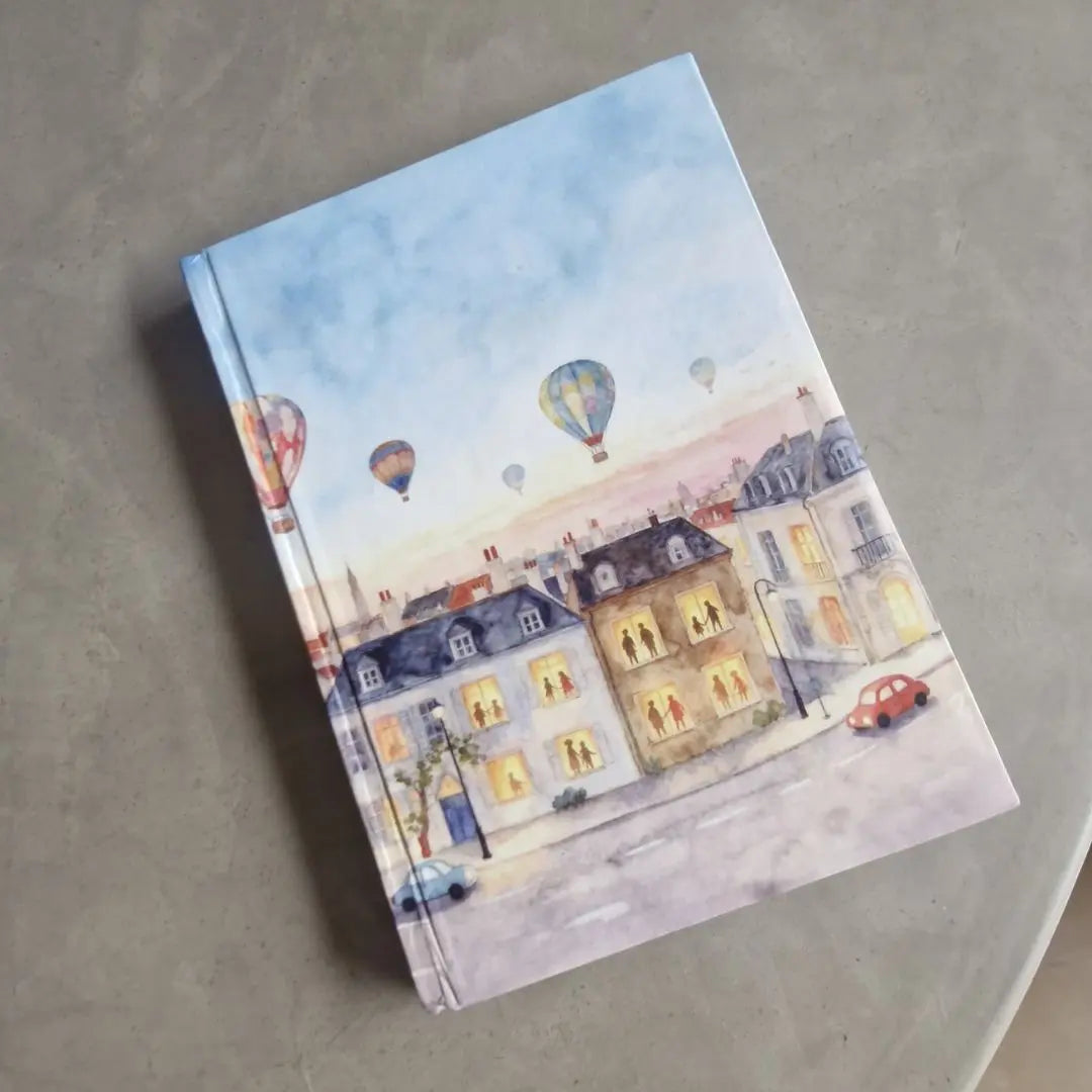 Windows of Wonder – A5 Hardbound Notebook (200 Plain Pages) The confetti tree